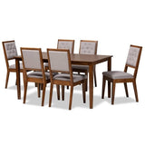 Contemporary dining table with cushioned chairs