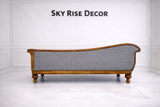 Designer Victorian chaise lounge furniture with luxury upholstery and carved wooden base