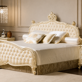 “Ivory upholstered antique style wooden bed”