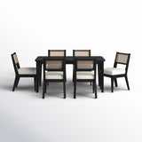 Coastal style teak dining table with woven cane chairs