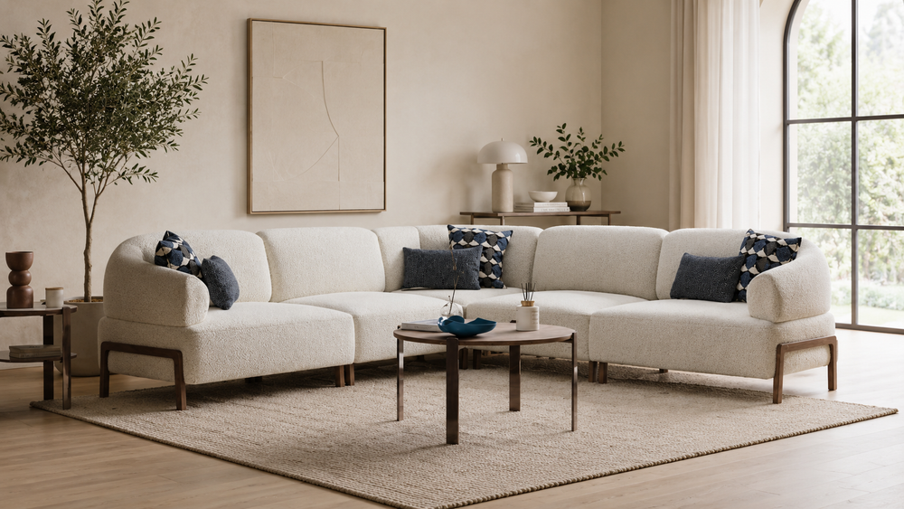 Luxury curved sectional sofa in cream boucle fabric with teak wood base