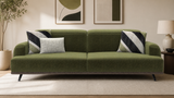 Luxury olive green velvet sofa with teak wood base by Sky Rise Decor