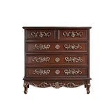 Traditional teak wood storage cabinet with decorative carved drawers