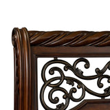 Elegant carved wood bed frame with footboard