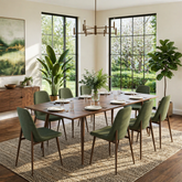 modern wood dining table with green chairs