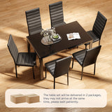 Contemporary dining room setup with black dining set