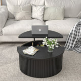 Round black coffee table with fluted wood base and matte finish