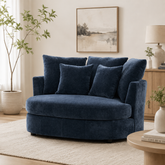 Navy blue round lounge chair with cushions