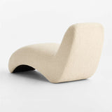 Premium cream bouclé armchair with ergonomic curved silhouette