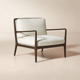 Contemporary upholstered teak armchair