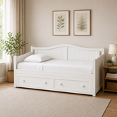 White teak wood daybed with storage drawers.