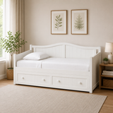 White teak wood daybed with storage drawers.
