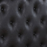 dark wood bed with button tufted headboard