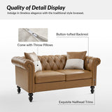 Classic Chesterfield sofa with button tufted leather upholstery
