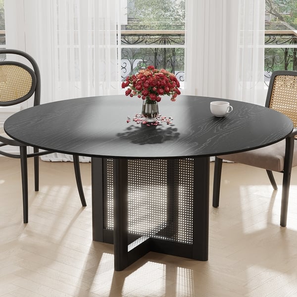 Dining table with wooden chairs and cane backrest