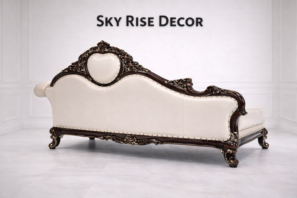 Antique style teak wood chaise lounge sofa with decorative carving and luxury upholstery
