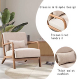 Modern beige armchair with pillow for cozy reading nook