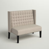 Handcrafted teak wood accent sofa with nailhead trim