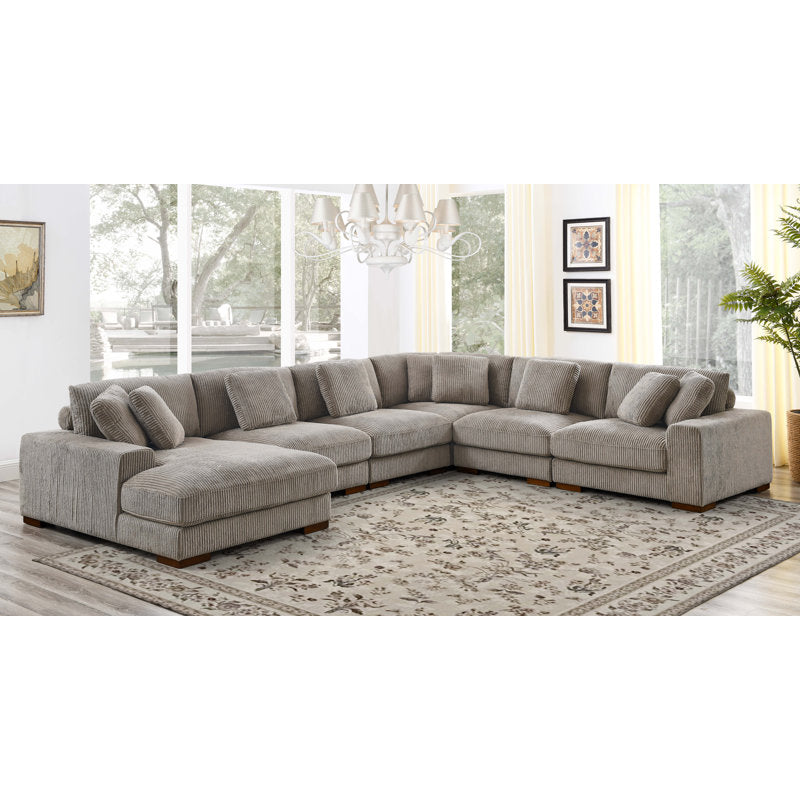Elegant beige sectional sofa by Sky Rise Decor