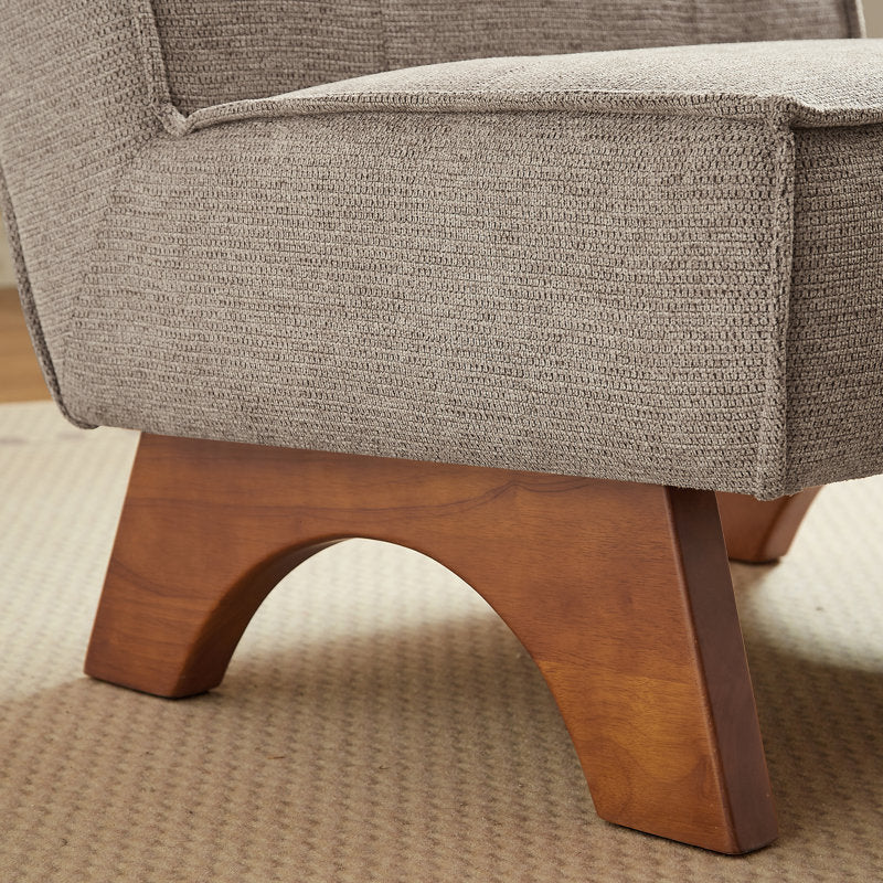 beige fabric lounge chair with solid teak wood legs