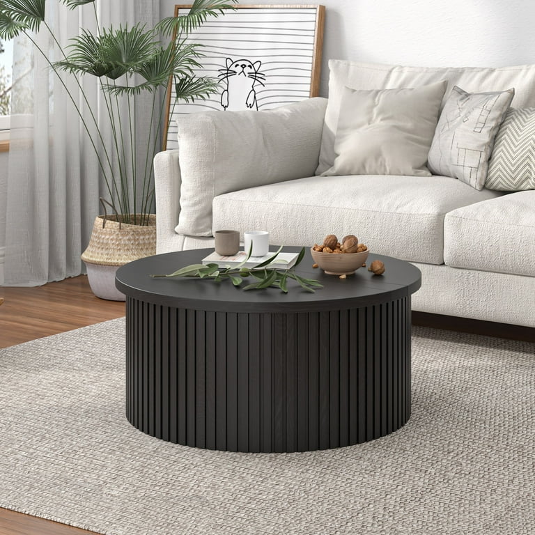 Minimalist black fluted coffee table in neutral living room setting