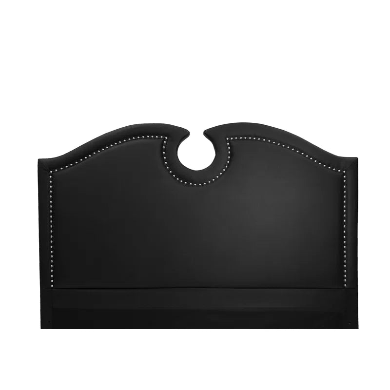 Luxury black bed with curved headboard