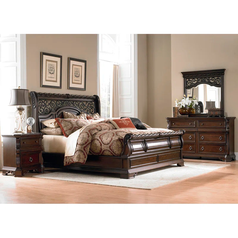 Dark wood sleigh bed in classic bedroom setting