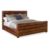 Stylish leather bed in modern bedroom setting
