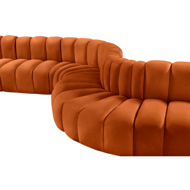 Elegant curved lounge sofa with teak wood base