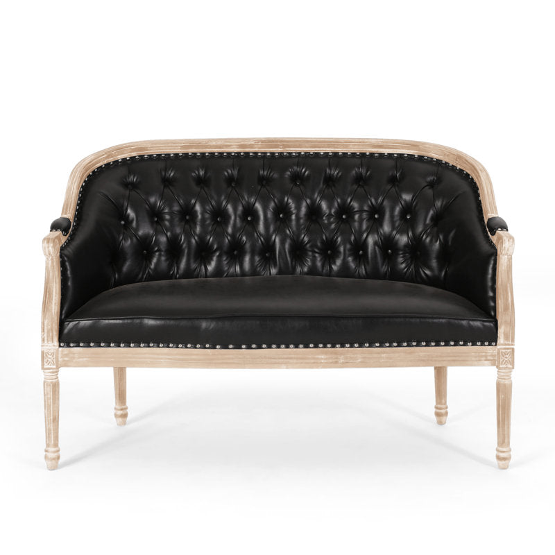 Elegant black button tufted sofa with natural teak wood frame