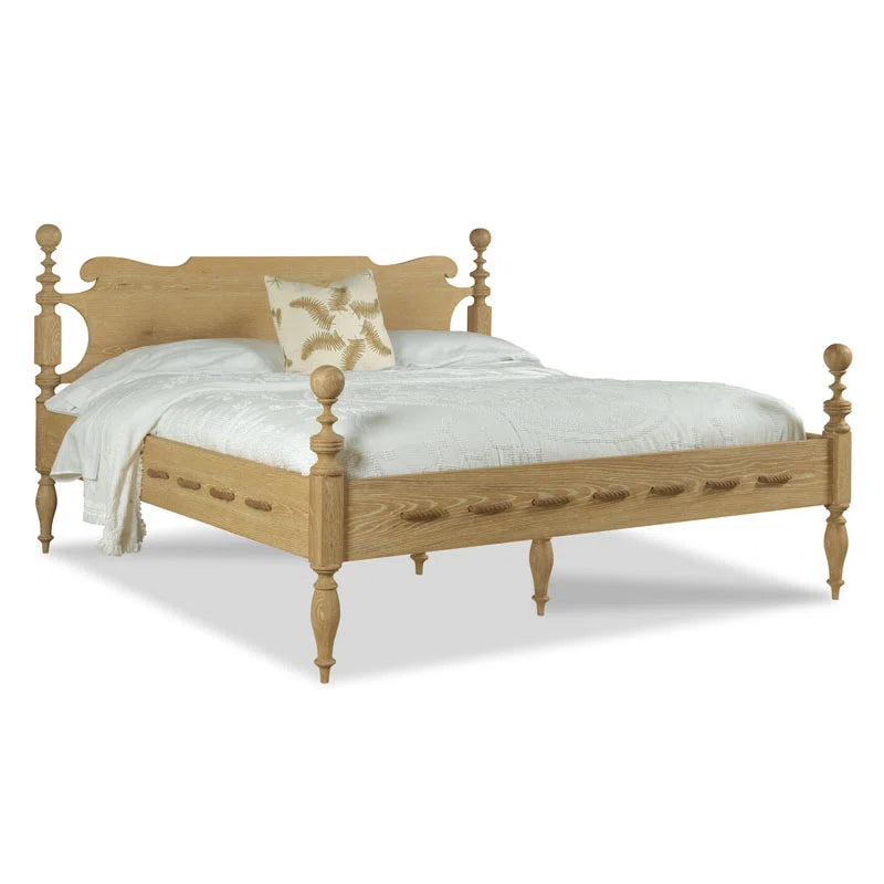 Farmhouse wooden bed with turned posts and headboard