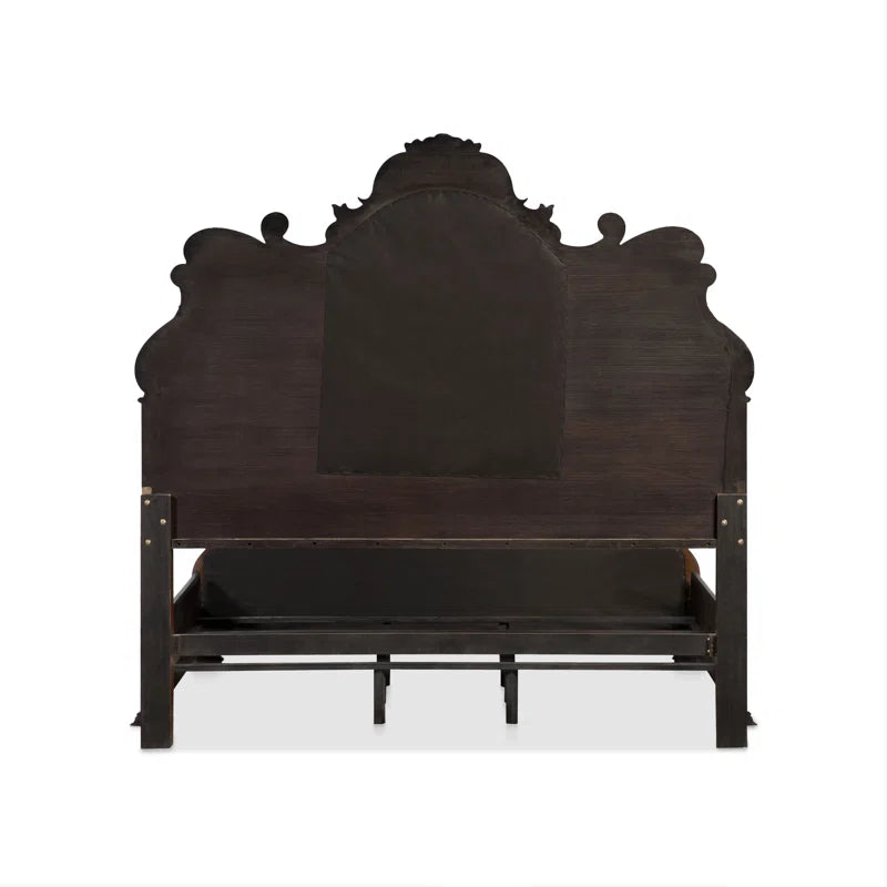 Handcrafted wooden bed with tufted headboard