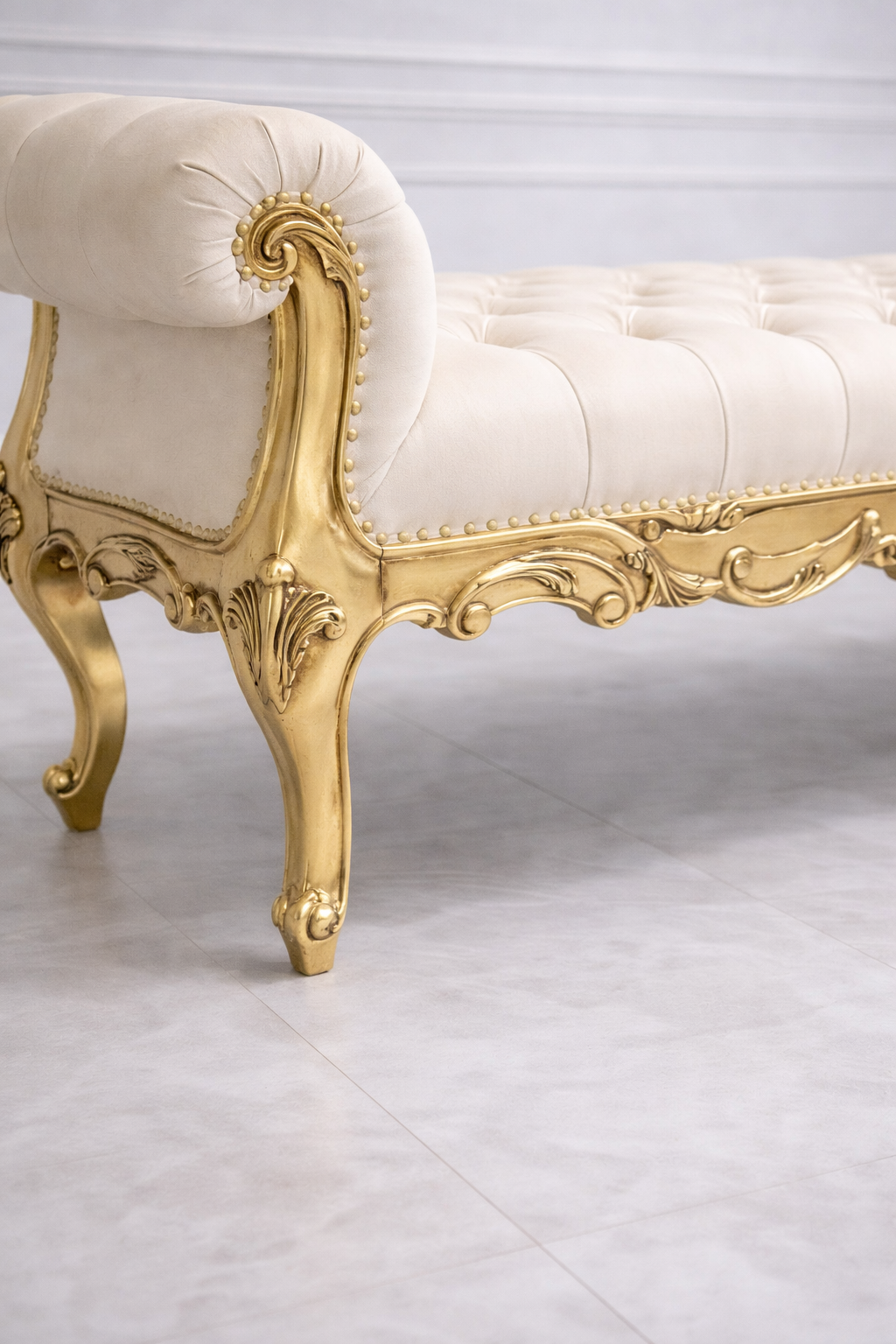 Luxury gold carved bench with tufted upholstered seat for entryway décor

