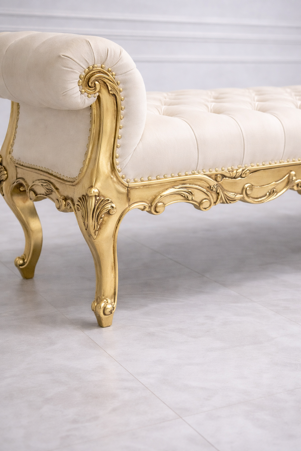 Luxury gold carved bench with tufted upholstered seat for entryway décor
