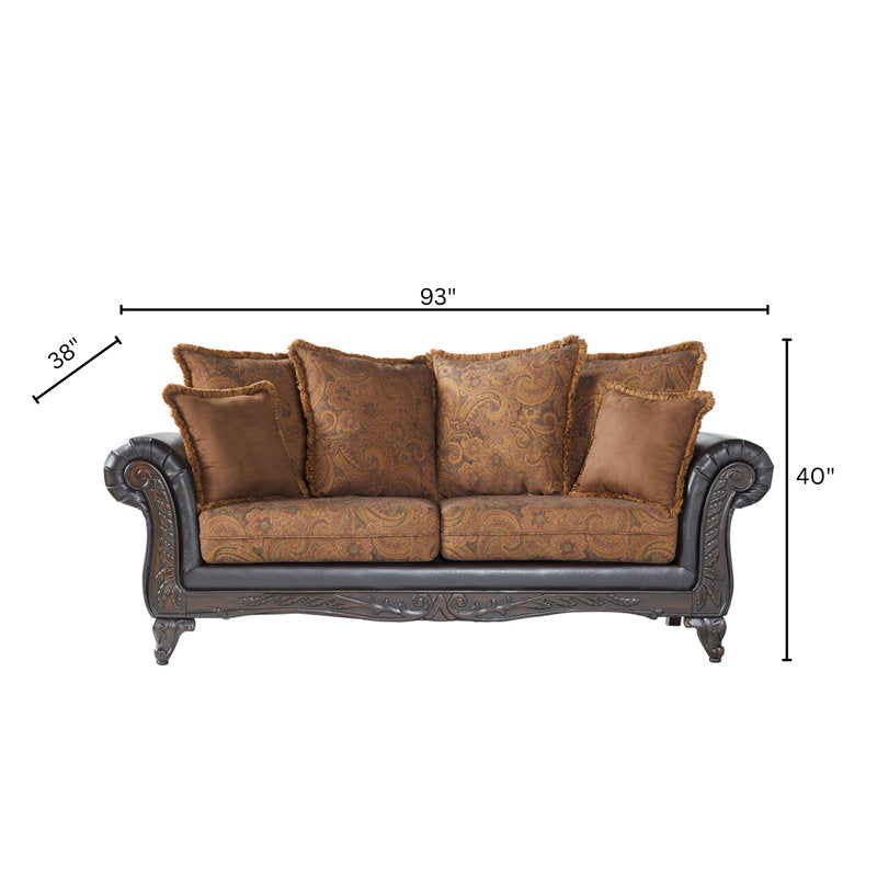 Elegant teak wood sofa with decorative pillows