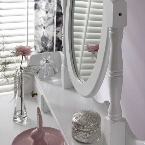 white makeup vanity with storage drawers