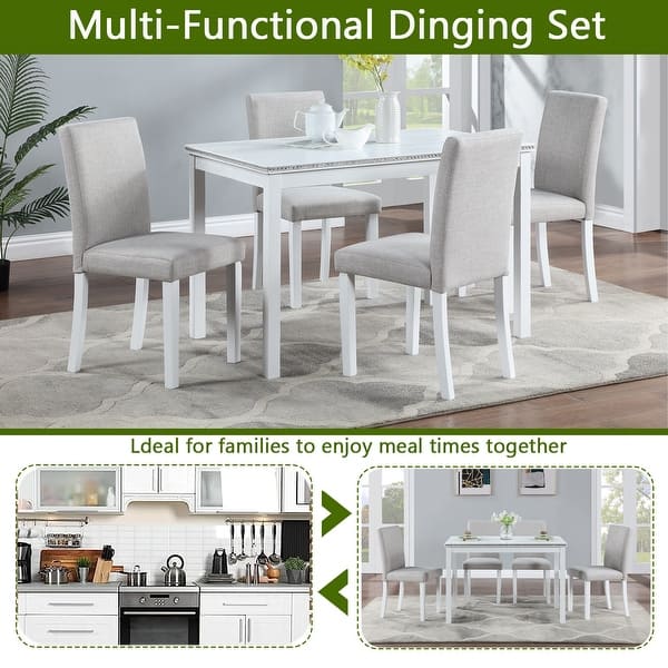 White rectangular dining table with upholstered chairs