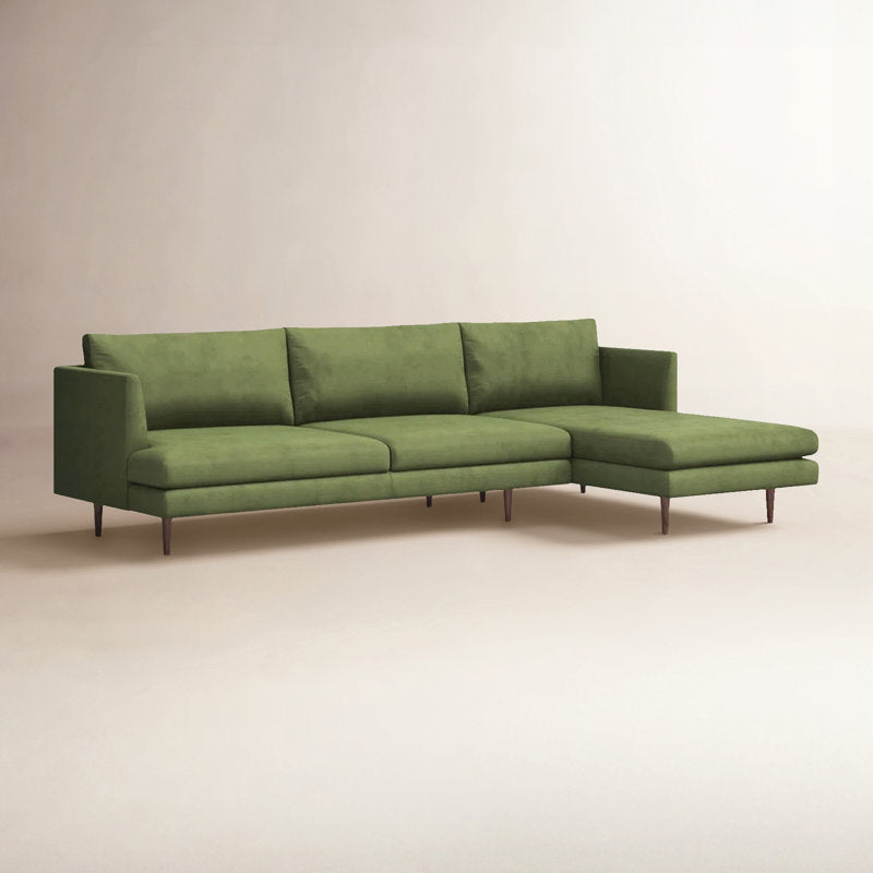 Luxury green velvet L-shaped sofa by Sky Rise Decor