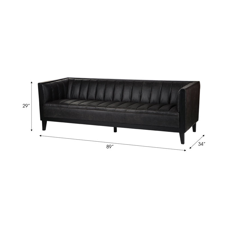 Elegant black 3-seater sofa in stylish room setup