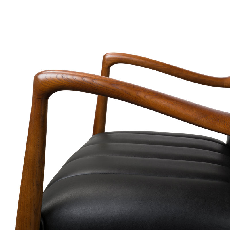 Premium teak wood chair with channel tufted upholstery