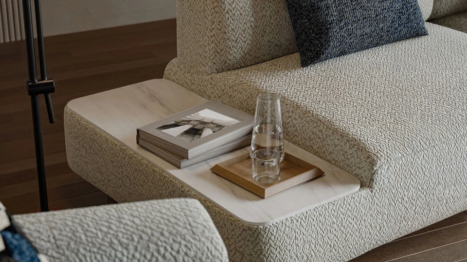 Modern cream sectional couch with curved silhouette