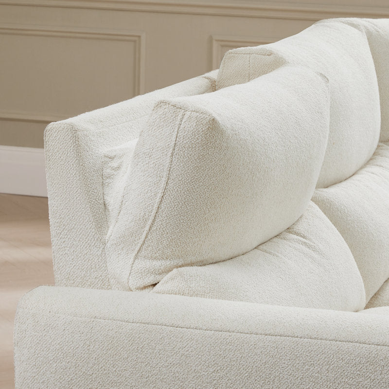 Designer curved sofa in cream fabric with teak wood construction