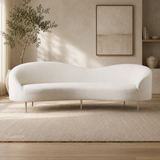 Modern curved teak wood sofa with cream upholstery
