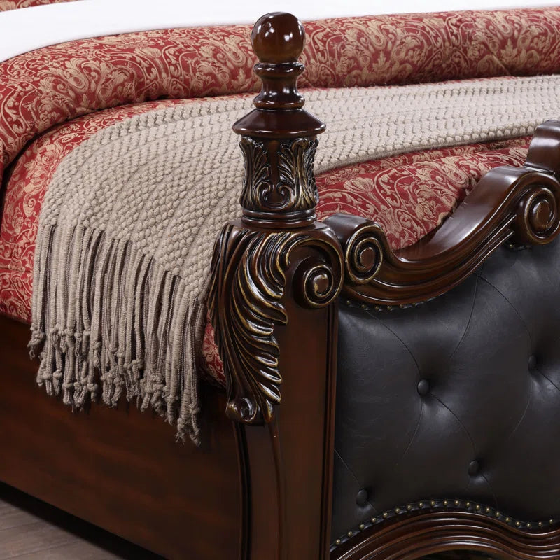 elegant carved wooden bed with leather upholstery