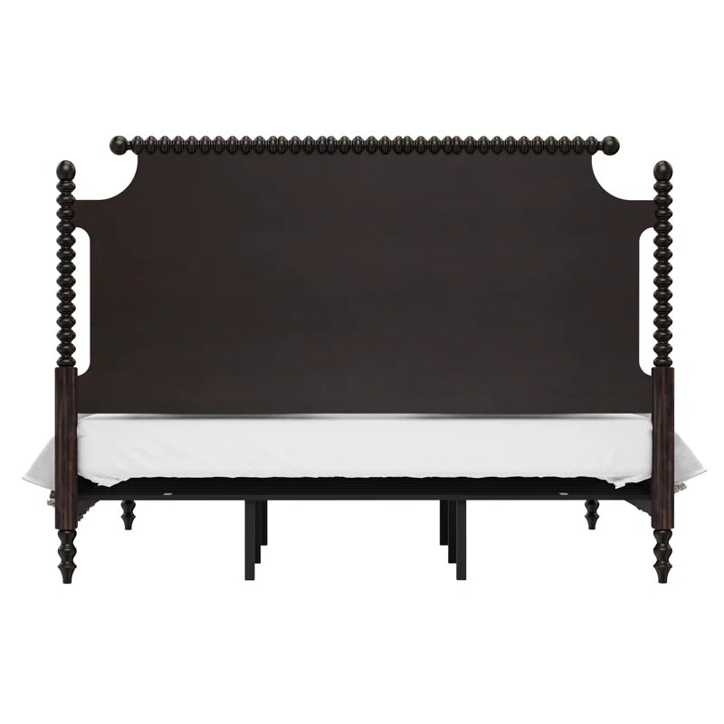 ​Elegant dark walnut spindle headboard and footboard in rustic brick room