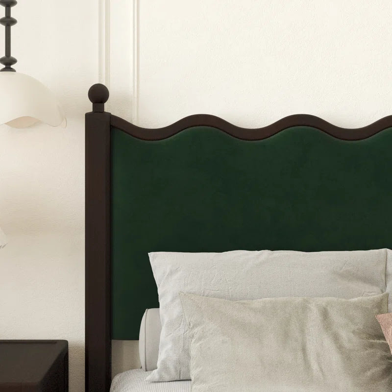 Elegant dark wood bed with stylish curved frame