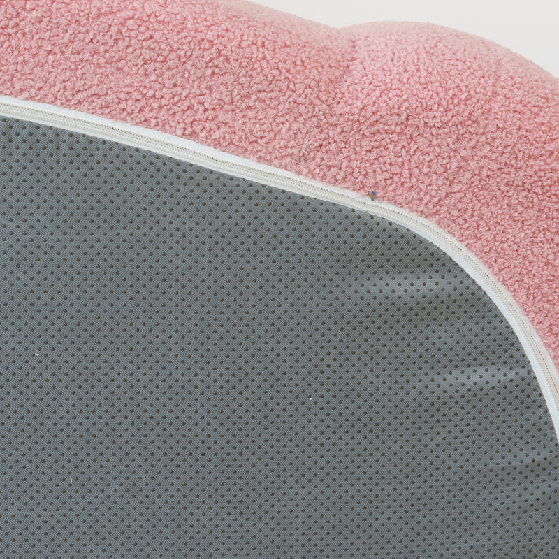Three-seater pink bouclé sofa