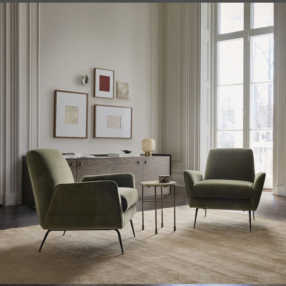 Luxury upholstered teak wood armchair with metal legs