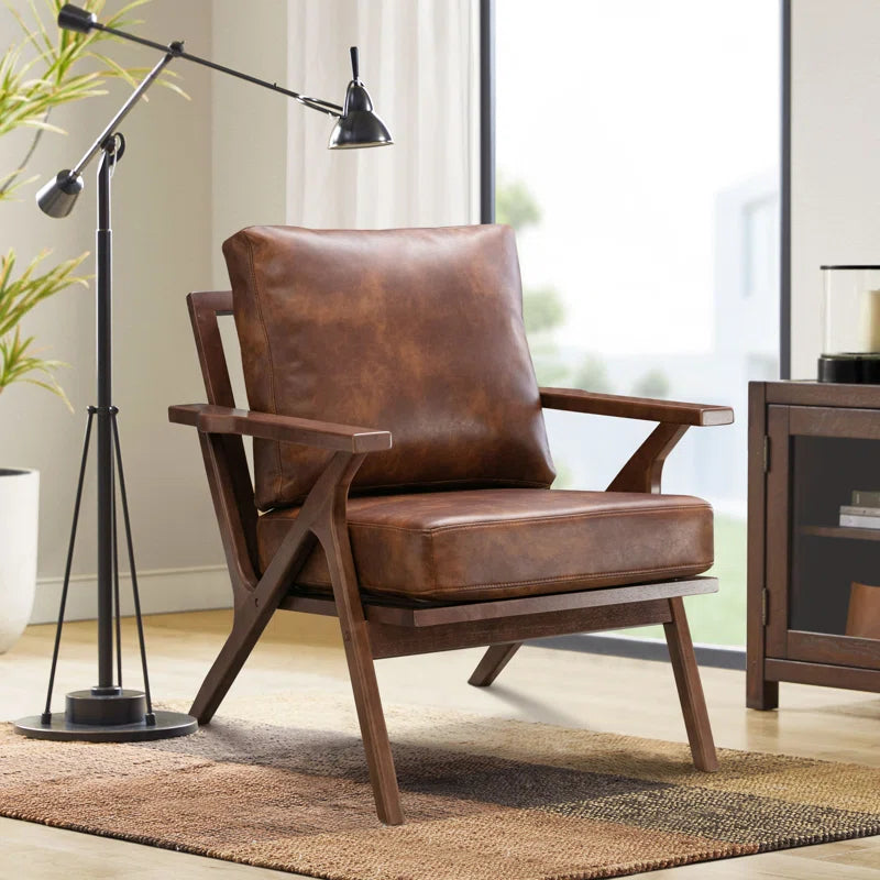 Designer teak wood armchair with leather cushion
