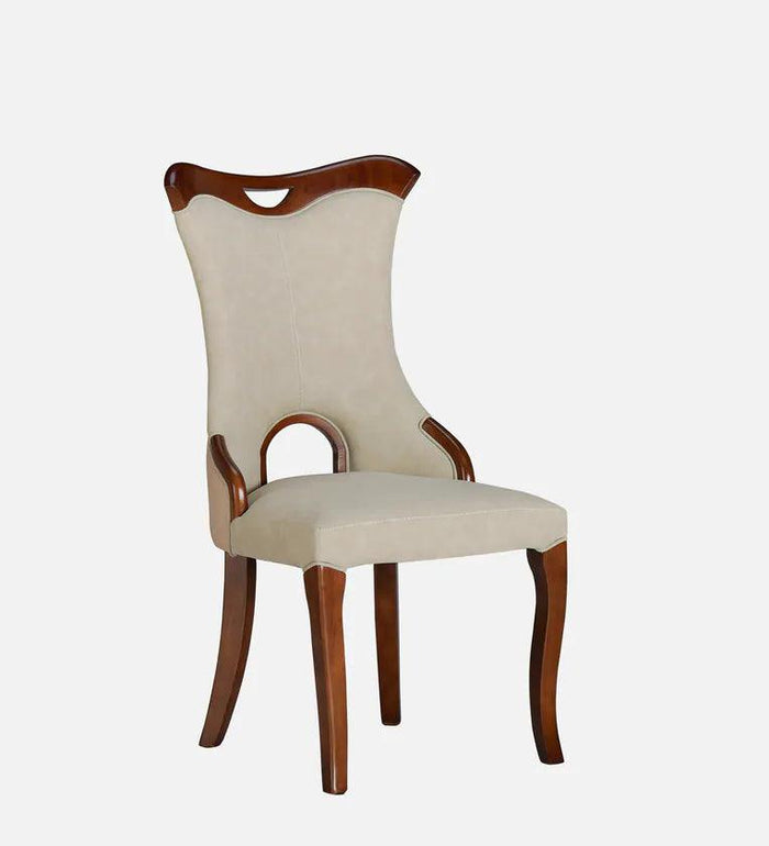 Elegant upholstered dining chairs with teak wood table